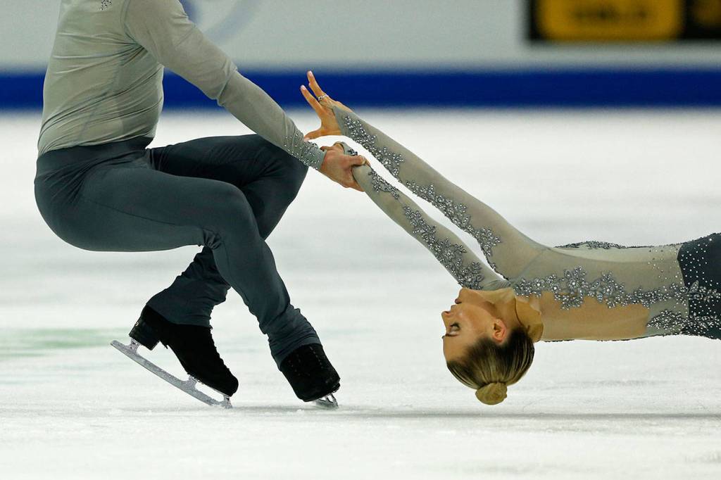 Ashley Cain is spun by her partner Timothy Leduc during the pairs free skating program at the 2018 Skate America competition on Saturday at Angel of the Winds Arena in Everett. (Olivia Vanni / The Herald)