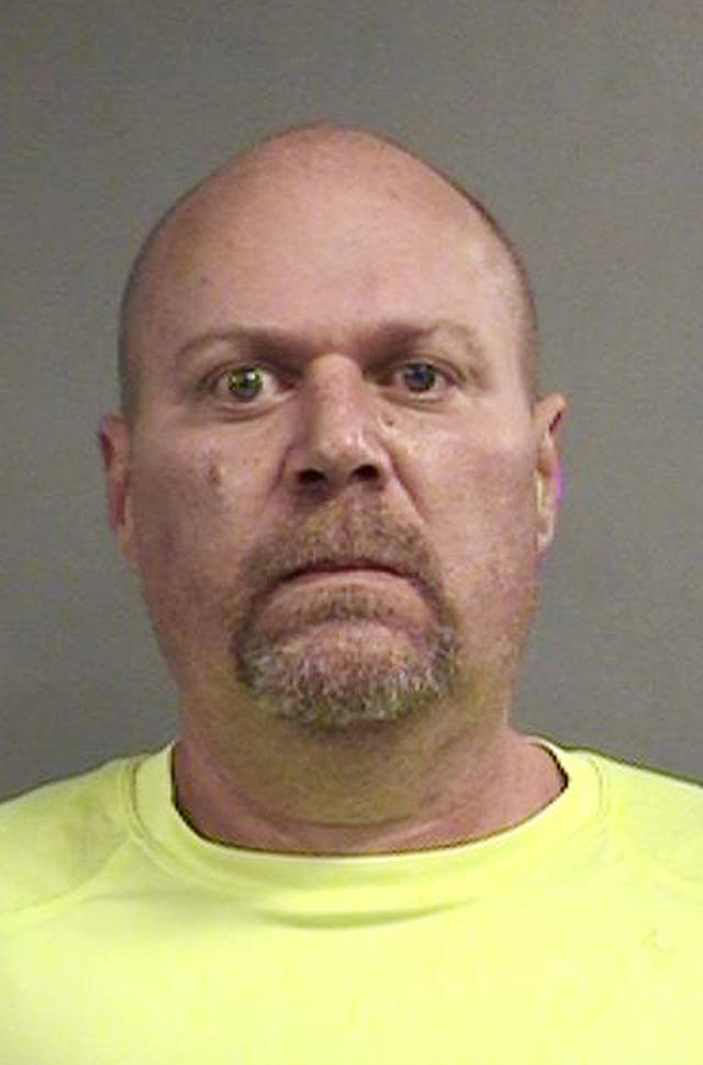 Gregory Alan Bush, who was booked early Thursday on two counts of murder and 10 counts of felony wanton endangerment, according to Louisville Metro Detention Center records. (Louisville Metro Department of Corrections via AP)