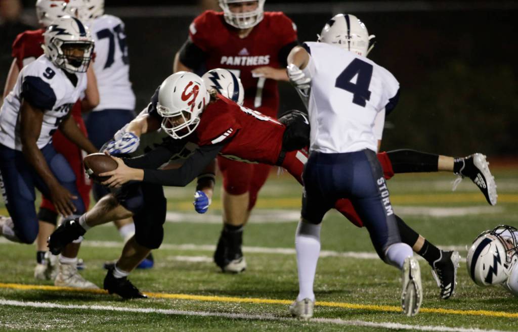 Snohomishs Tayte Conover dives in for a touchdown during the Panthers 30-27 win over Squalicum on Fridayat Veterans Memorial Stadium in Snohomish. (Andy Bronson / The Herald)