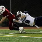Squalicums Declan McGhee (right) tackles Snohomishs Tyler Massena just short of the end zone during the Panthers 30-27 win Fridayat Veterans Memorial Stadium in Snohomish. (Andy Bronson / The Herald)