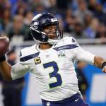 Wilson throws three TD passes in Seahawks’ victory over Lions