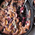 This friand is made with plum, blackberry and bay leaves, but you can put all kinds of fruit in them. (Photography by Jonathan Lovekin)