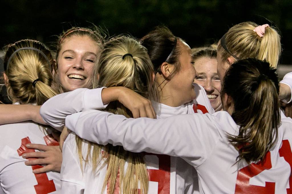 Snohomish celebrates a 4-3 win over Squalicum in a 3A Northwest District 1 Tournament game on Oct. 30, 2018, at Shoreline Stadium. (Kevin Clark / The Herald)