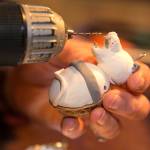 Caralee Hudson works on ornaments at her home. (Kevin Clark / The Herald)