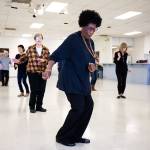 Diane Flagg twists during a line dance class at the Edmonds Senior Center on Monday, Oct. 29, 2018 in Edmonds, Wa. Flagg, 71, who lost her husband two years ago, dances five times a week. (Andy Bronson / The Herald)                                Diane Flagg twists during a line dance class at the Edmonds Senior Center on Monday, Oct. 29, 2018 in Edmonds, Wa. Flagg, 71, who lost her husband two years ago, dances five times a week. (Andy Bronson / The Herald)