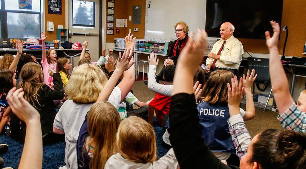 Following the students play performance, invited guests Margaret Fisher, attorney and faculty member Seattle University School of Law and U.S. District Court Judge John Coughenour were greeted by enthusiastic youngsters with lots of questions. (Dan Bates / The Herald)