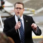 In this 2017 photo, Rep. Matt Shea, R-Spokane, speaks at a gun-rights rally, at the Capitol in Olympia. Shea is facing intense criticism for distributing a document describing how a Holy Army should kill people who flout biblical law, with some campaign donors asking for their contributions back. (AP Photo/Ted S. Warren,File)