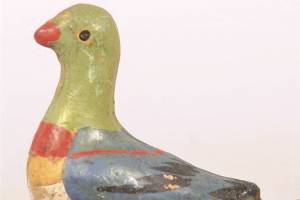 Early whistles were molded from clay into shape of a bird