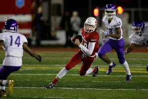 Snohomishs Tayte Conover runs for a first down during Fridays game in Snohomish. (Andy Bronson / The Herald)