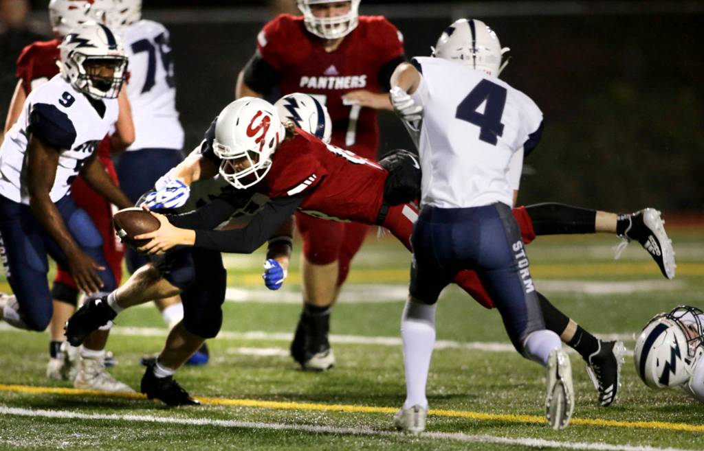 Snohomishs Tayte Conover dives for a touchdown as Snohomish beat Squalicum 30-27 at Veterans Memorial Stadium on Oct. 26 in Snohomish. (Andy Bronson / The Herald)