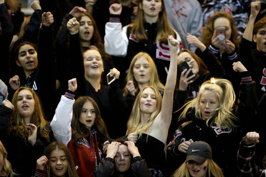 Students cheer after Snohomish beat Squalicum 30-27 at Veterans Memorial Stadium on Oct. 26 in Snohomish. (Andy Bronson / The Herald)