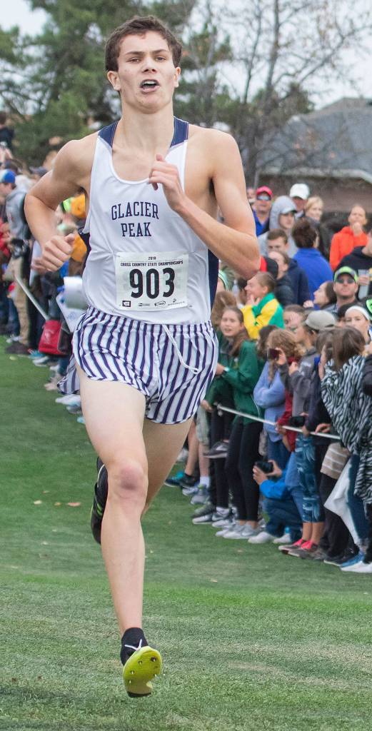 Glacier Peaks Riley McDowell runs in the 4A boys state cross country championship meet Saturday at Sun Willows Golf Course in Pasco. (TJ Mullinax / for The Herald)