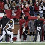 Washington States Dezmon Patmon catches a pass in front of Californias Josh Drayden during the first half of Saturdays game in Pullman. (AP Photo/Young Kwak)