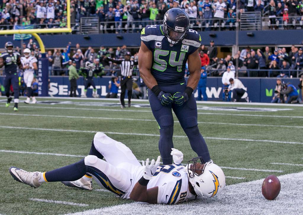 Seahawks linebacker Bobby Wagner stands over Chargers tight end Virgil Green after breaking up a pass Sunday afternoon at CenturyLink Field in Seattle on November 4, 2018. Chargers won 25-17. (Kevin Clark / The Herald)