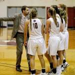 Meadowdale High School graduate Mike Simonson (rear left) is the head womens basketball coach at Seattle Pacific University. (Andrew Towell / Seattle Pacific / troutstreaming.com)