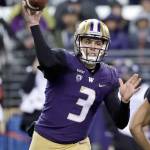 Washington quarterback Jake Browning throws during the first half of the Huskies 27-23 win over Stanford last Saturday in Seattle. (AP Photo/Elaine Thompson)