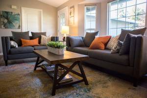 The living room space of the Hendersons home was decorated by Kelly DuByne, of Distinctive Interior Designs, in Lake Stevens. (Olivia Vanni / The Herald)