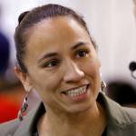 In Kansas, Democrat Sharice Davids beat a GOP incumbent to become the first Native American and gay woman elected to the House. (AP Photo/Charlie Riedel, File)