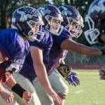 Members of the Lake Stevens offensive line run through a drill during practice on Nov. 7, 2018, at Lake Stevens High School. (Kevin Clark / The Herald)
