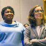 Georgia gubernatorial candidate Stacey Abrams (left) stands with her campaign manager, Lauren Groh-Wargo, before speaking to her supporters during an election night watch party at the Hyatt Regency in Atlanta, on Wednesday. (Alyssa Pointer/Atlanta Journal-Constitution via AP)