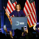 House Minority Leader Nancy Pelosi smiles as she is cheered by a crowd of Democratic supporters during an election night returns event at the Hyatt Regency Hotel on Tuesday in Washington. (AP Photo/Jacquelyn Martin)