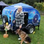 Tracy Cunningham had her Tink teardrop vinyl wrapped in the Disney theme of Tinkerbell. The skyline is Seattle. (Patricia Guthrie/Whidbey News Group)