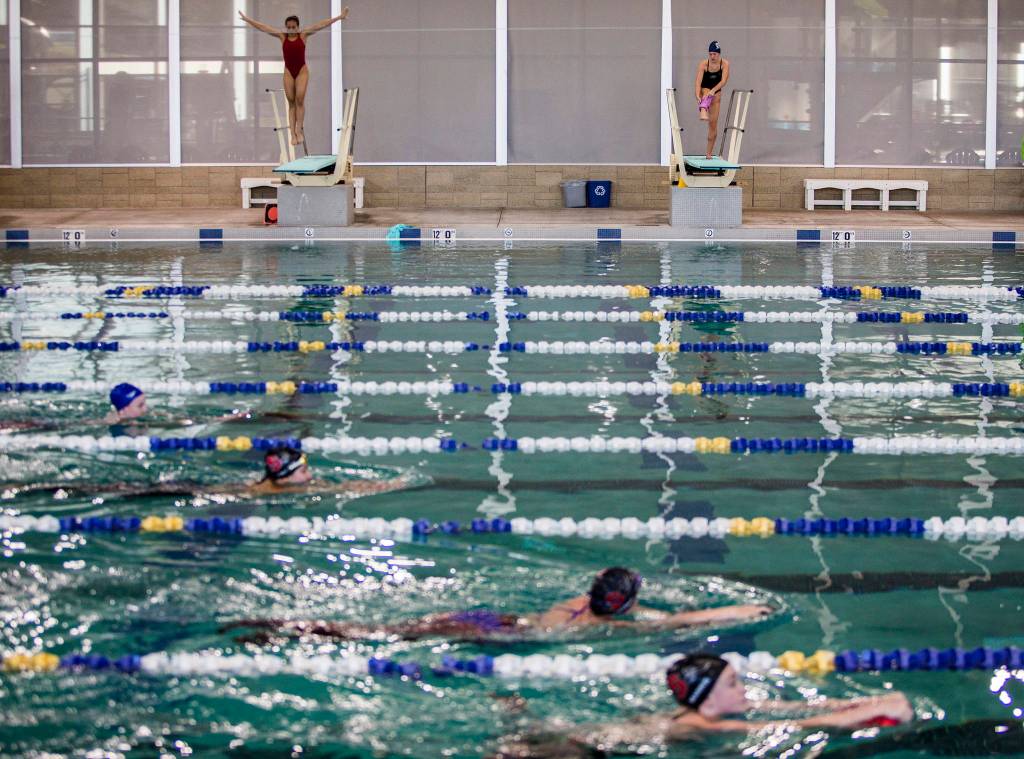 Swimmers and divers from Snohomish and Glacier Peak High School during practice at the Snohomish Aquatic Center on Wednesday, Nov. 7, 2018 in Snohomish, Wa. (Olivia Vanni / The Herald)