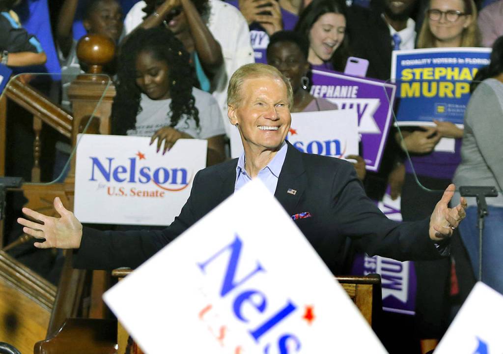 FILE- In this Oct. 23, 2018, file photo shows Sen. Bill Nelson campaigns in Orlando. Republican Gov. Rick Scott is challenging Nelson. Florida will vote for governor, U.S. Senate, Cabinet seats, Congress and decide 12 ballot questions. (Joe Burbank/Orlando Sentinel via AP, File)