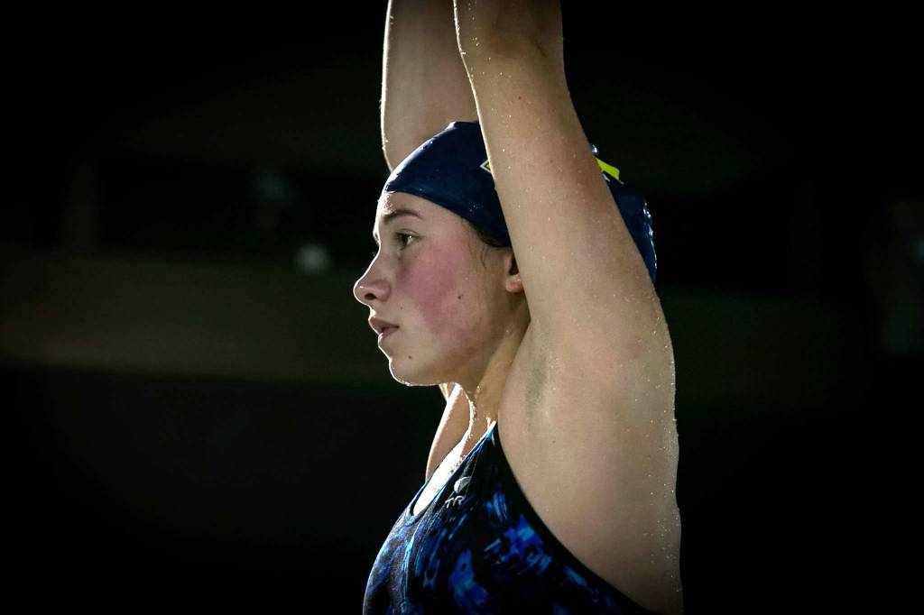 Hailey Faith of Everett High School  a three-time state competitor  prepares for a dive at Forest Park Swim Center in Everett on Oct. 17. (Kevin Clark / The Herald)