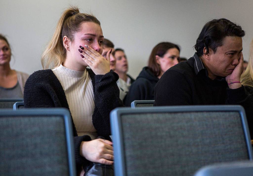 Katherine Koziol (left ) a friend of Alyssa Noceda, reacts to a letter being read to the judge during the sentencing of Brian Varela in Snohomish County Superior Court on Thursday in Everett. (Olivia Vanni / The Herald)