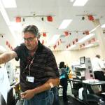 A worker loads ballots into machines at the Broward County Supervisor of Elections office during a recount on Tuesday in Lauderhill, Florida. (AP Photo/Brynn Anderson)