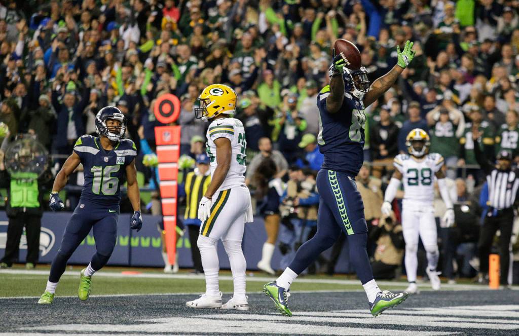 Seattles Ed Dickson celebrates after scoring the winning touchdown in the fourth quarter of Thursdays game at CenturyLink Field. (Andy Bronson / The Herald)
