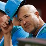 Seattles Manny Acta reacts to a play in the first inning of an Aug. 24 game in Phoenix. (AP photo / Rick Scuteri)