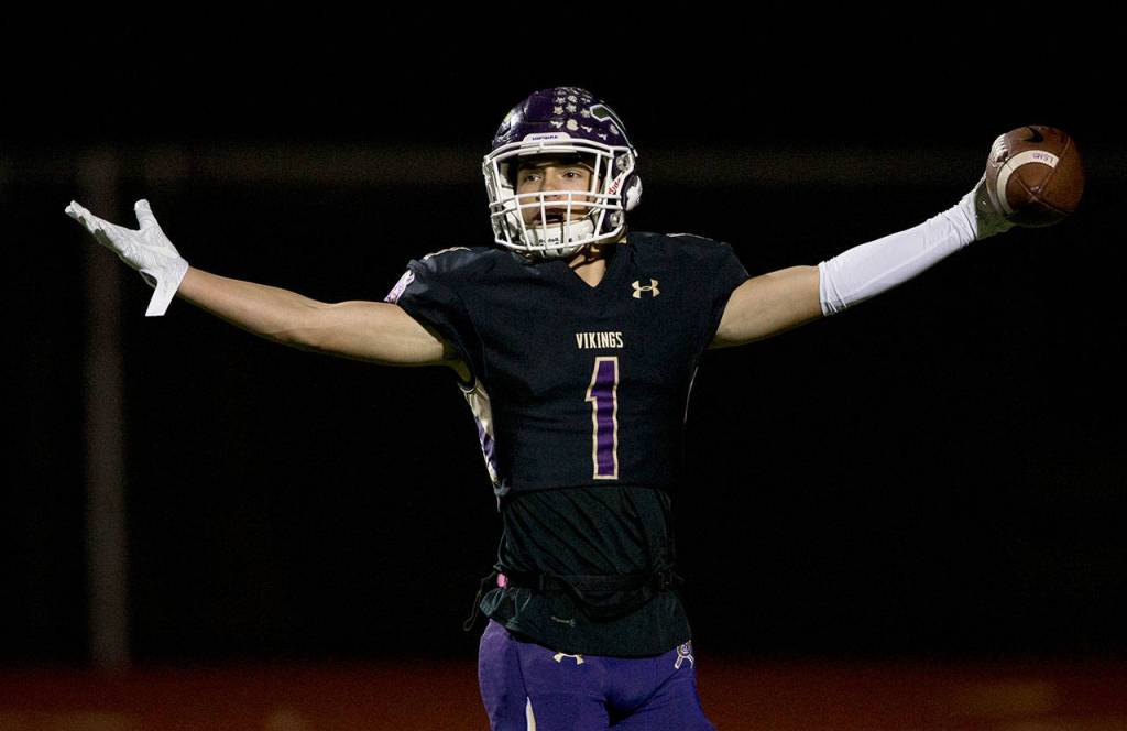 Lake Stevens Ian Hanson celebrates after his touchdown during a 4A state quarterfinal game against Graham-Kapowsin on Nov. 17, 2018, in Lake Stevens. (Olivia Vanni / The Herald)