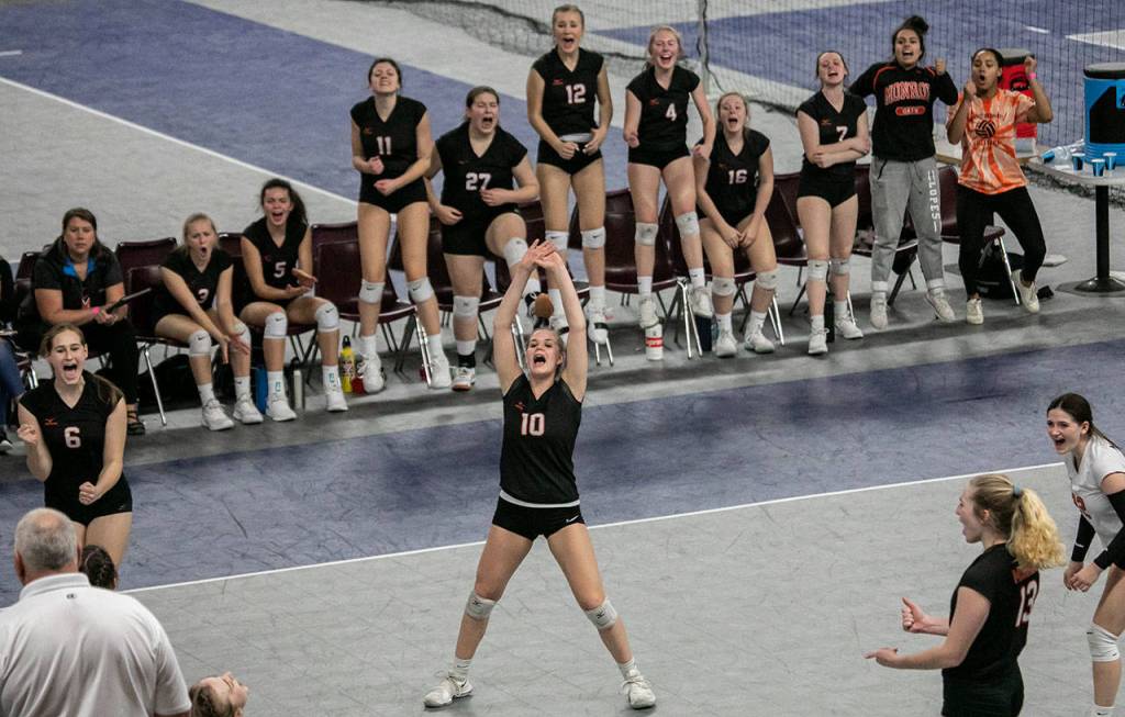Monroes Tatum McGovern screams with her team after winning a point against Kentridge during a 4A state consolation match on Nov. 17, 2018, at the Yakima Valley SunDome in Yakima. (TJ Mullinax / For The Herald)