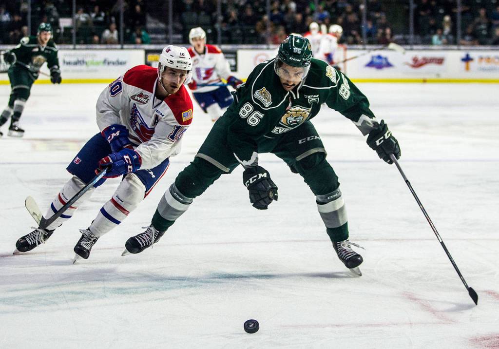 Silvertips Sahvan Khaira skates after the puck during the game against the Spokane Chiefs on Nov. 18 in Everett. (Olivia Vanni / The Herald)