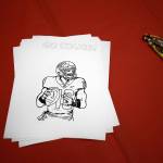 Dutch Hill Elementary held an Apple Cup-themed Dads n Donuts event, with the gym decked out in Cougar and Husky colors, on Nov. 21, 2018, in Snohomish. (Andy Bronson / The Herald)