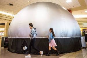 Journey into space from a lawn chair at the mall