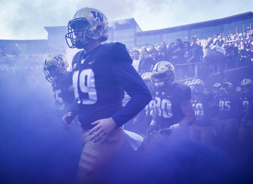 Washingtons A.J. Party runs out onto the field before the game against Oregon State on Saturday, Nov. 17, 2018 in Everett, Wa. (Olivia Vanni / The Herald)