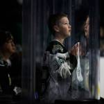 A young Silvertips fan looks up at the jumbotron before <a href="https://www.heraldnet.com/sports/silvertips-fall-in-overtime-to-spokane-chiefs-in-overtime/" target="_blank">the game against the Spokane Chiefs</a> on Nov. 18 in Everett. (Olivia Vanni / The Herald)