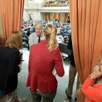 House Speaker Frank Chopp (third from left), D-Seattle, huddles with legislative staffers in the wings of the House last March. (AP Photo/Ted S. Warren)