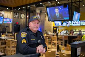 Everett Police Department Sgt. John Zeka and his fellow officers will be serving and waiting tables at Buffalo Wild Wings during the Tip-A-Cop fundraiser on Saturday. shot on Wednesday, Nov. 28, 2018 in Everett, Wa. (Andy Bronson / The Herald)
