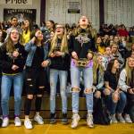 Members of the Lake Stevens Cross Country team and other fall sports teams cheer during the pep rally send-off for the Lake Stevens football team Friday in Lake Stevens. (Olivia Vanni / The Herald)