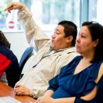 Roberto Galeana asks a questions as he, his wife and their five children take part in the Parent Leadership Training Institute and the Childrens Leadership Institute on Saturday, Nov. 17, 2018 in Everett, Wa. At left is son Robert Galeana and wife Blanca, right. (Andy Bronson / The Herald)