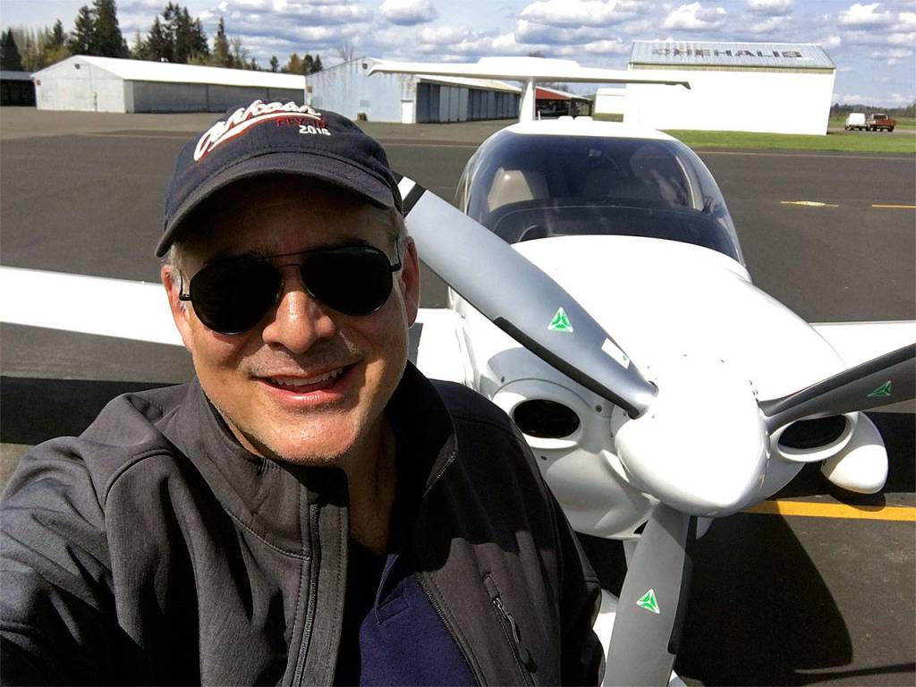 Greg Bell, of Edmonds, was recently recognized for logging 100 flights in the Experimental Aircraft Associations Young Eagles program. Bell takes kids up in his Diamond Star DA40 to give them a taste of general aviation. (Contributed photo)