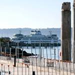 A ferry docks at the current ferry terminal Oct. 11, while part of the new terminal was under construction. (Kevin Clark / Herald file)