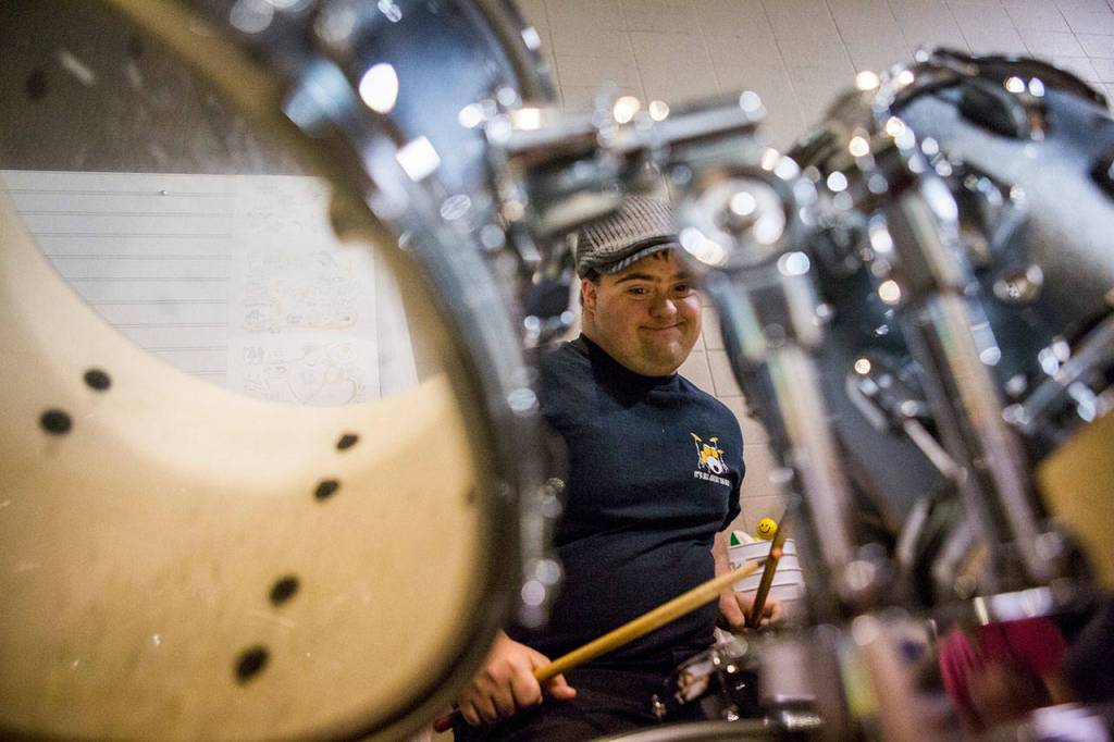 Scott Grossman, 20, plays the drums during the Music YoU-ROCK program at the Northwest Music Hall in Everett. (Olivia Vanni / The Herald)