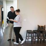 Heather and Tyler Ferrel examine paperwork related to a house they intend to buy in Marysville. (Andy Bronson / The Herald)