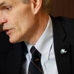 Everetts new Director of Economic Development Dan Eernissee sports a University of Washington tie, harkening back to his time as a center on the Husky football team, on Nov. 21 in Everett. (Andy Bronson / The Herald)