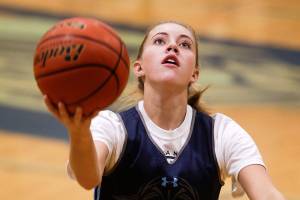 Meadowdale Highs Camryn Cassidy practices layups on Monday, Nov. 19, 2018 in Lynnwood, Wa. (Andy Bronson / The Herald)